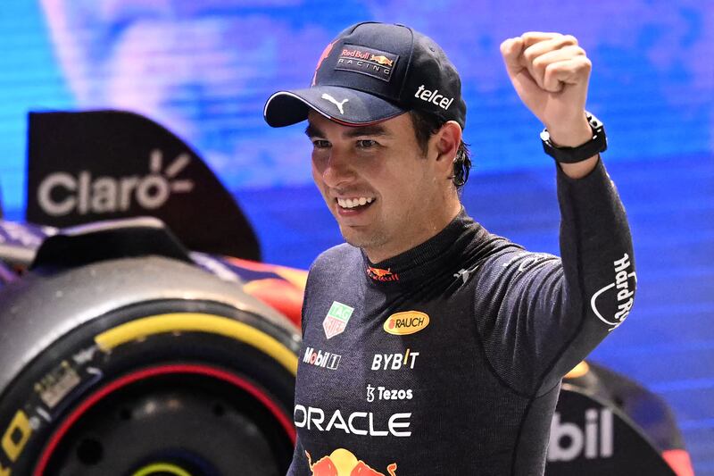 Mexican driver Sergio Perez celebrates. AFP