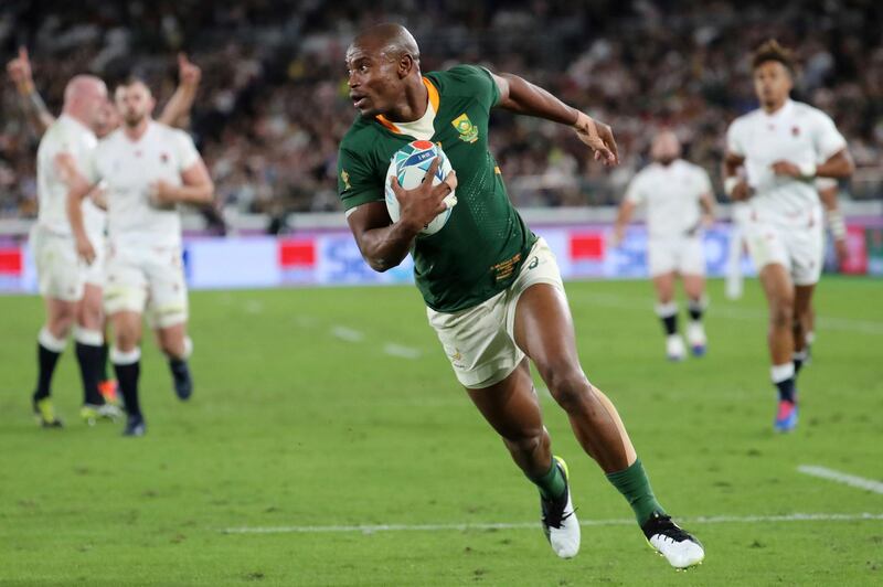 Makazole Mapimpi runs for his try in the Rugby World Cup final. AP Photo