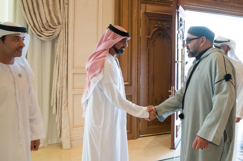 ABU DHABI, UNITED ARAB EMIRATES - September 10, 2018: HH Sheikh Ammar bin Humaid Al Nuaimi, Crown Prince of Ajman (C), greets HM King Mohamed VI of Morocco (R), during a Sea Palace barza. Seen with HH Sheikh Hazza bin Zayed Al Nahyan, Vice Chairman of the Abu Dhabi Executive Council (L).

( Mohamed Al Hammadi / Crown Prince Court - Abu Dhabi )
---