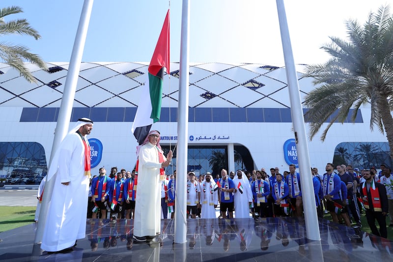 Members of Al-Nasr Sports Club in Dubai celebrate the flag day.