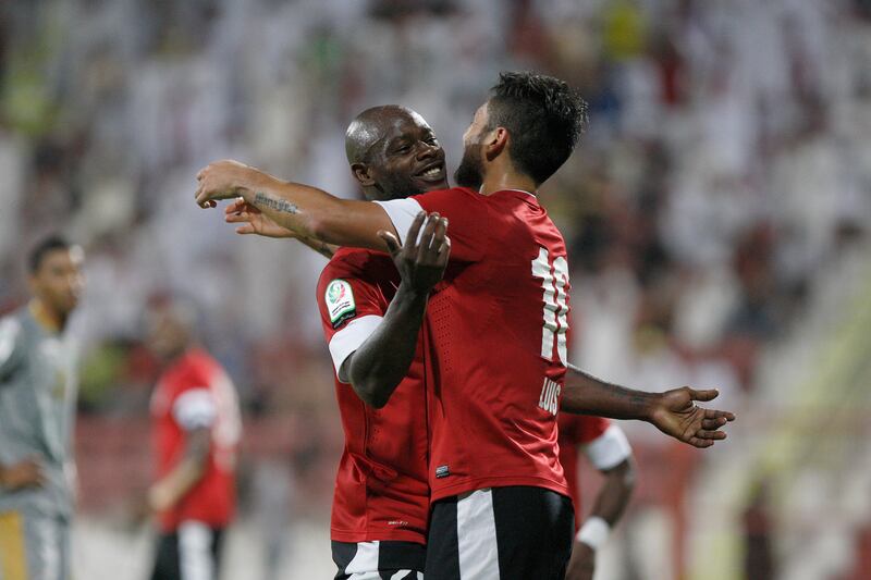 Dubai, United Arab Emirates, Oct 21, 2012, Al Ahli v  Al Shabab, Al Rashid Stadium . Al Ahli's #10 Louis Antonio Jiminez and  Grafite celebrate Lois goal and Grafite's assist during action at Al Rashid Stadium  Oct 21 2012. Mike Young / The National 