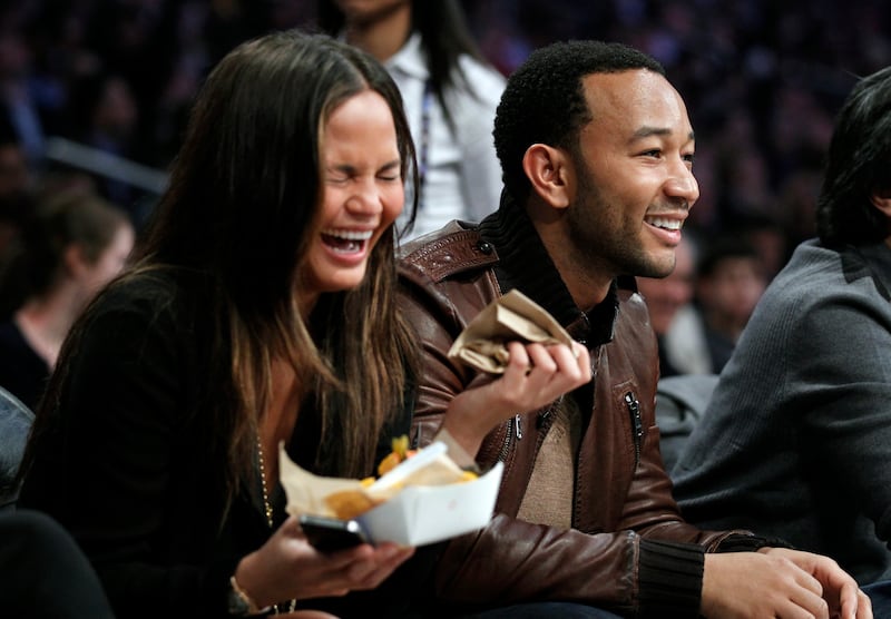 Teigen and Legend attend the NBA All-Star basketball game in Los Angeles on February 20, 2011. Reuters