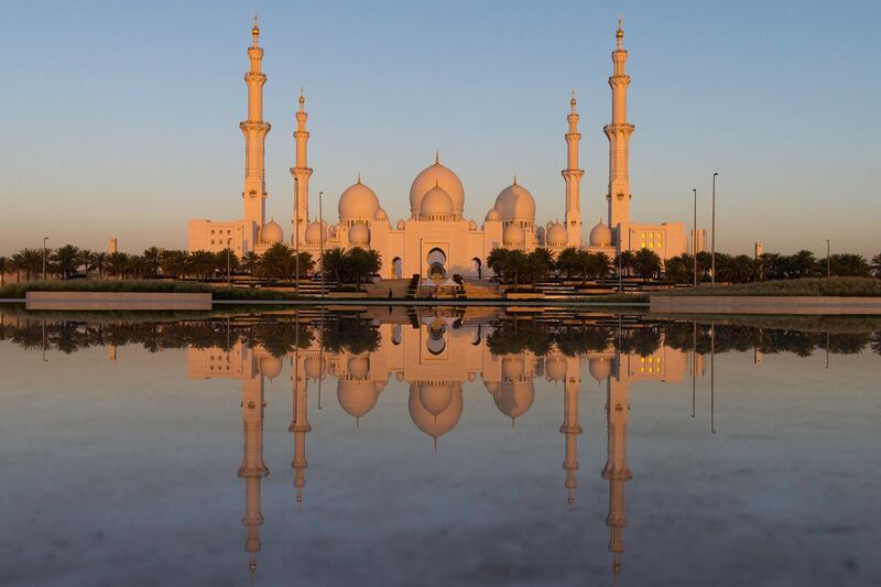 Abu Dhabi, United Arab Emirates, May 27, 2017:    Sheikh Zayed Grand Mosque is seen during sun rise on the first day of the holy month of Ramadan from Wahat Al Karama, the martyrs' memorial, in Abu Dhabi on May 27, 2017.  Muslims around the globe observe the holy fasting month of Ramadan where they refrain from drinking, eating, smoking and sex from dawn to dusk. Christopher Pike / The National

Job ID: 84573
Reporter:  N/A
Section: News
Keywords: *** Local Caption ***  CP0527-na-morning prayers-AD-05.JPG