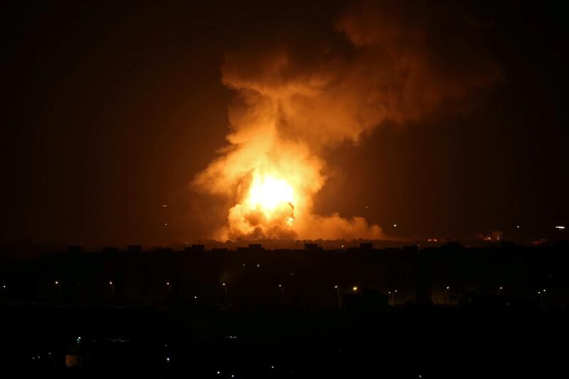 Flame and smoke are seen during an Israeli air strike in the central Gaza Strip September 11, 2019. REUTERS/Ibraheem Abu Mustafa     TPX IMAGES OF THE DAY