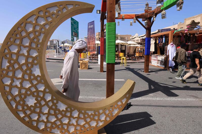 People out and about at Dubai's Souq Ramadan on Monday. This Ramadan is being held with none of the restrictions that overshadowed previous celebrations. AFP