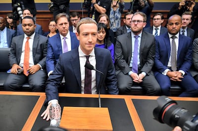 Facebook Chairman and CEO Mark Zuckerberg arrives to testify before the House Financial Services Committee on "An Examination of Facebook and Its Impact on the Financial Services and Housing Sectors" in the Rayburn House Office Building in Washington, DC on October 23, 2019. (Photo by MANDEL NGAN / AFP)