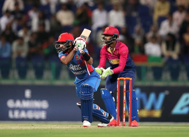 Afghanistan's Karim Janat secured victory against the UAE with his late run blitz at Zayed Cricket Stadium, Abu Dhabi. Chris Whiteoak / The National