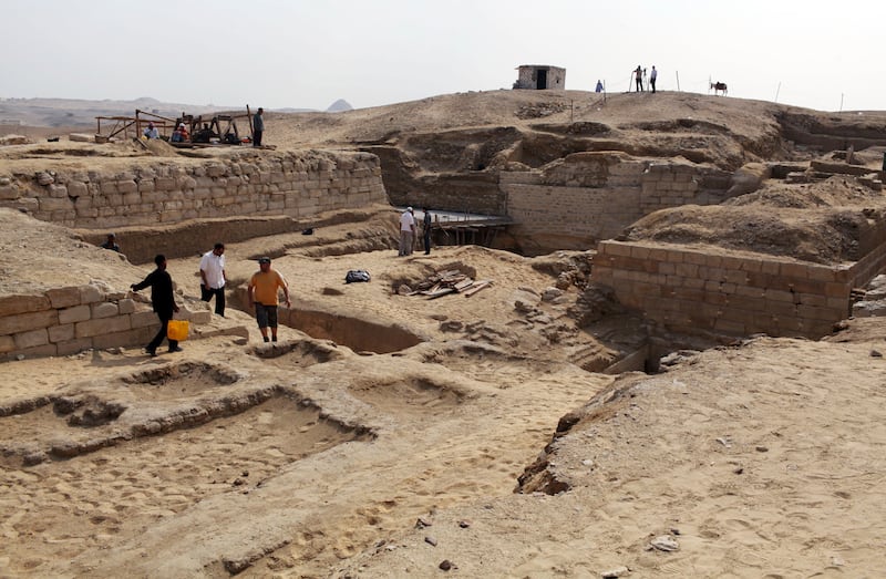 Archaeologists and workers at the site of a complex of tombs, including one of a Pharaonic princess, in the Abusir region south of Cairo.  Reuters