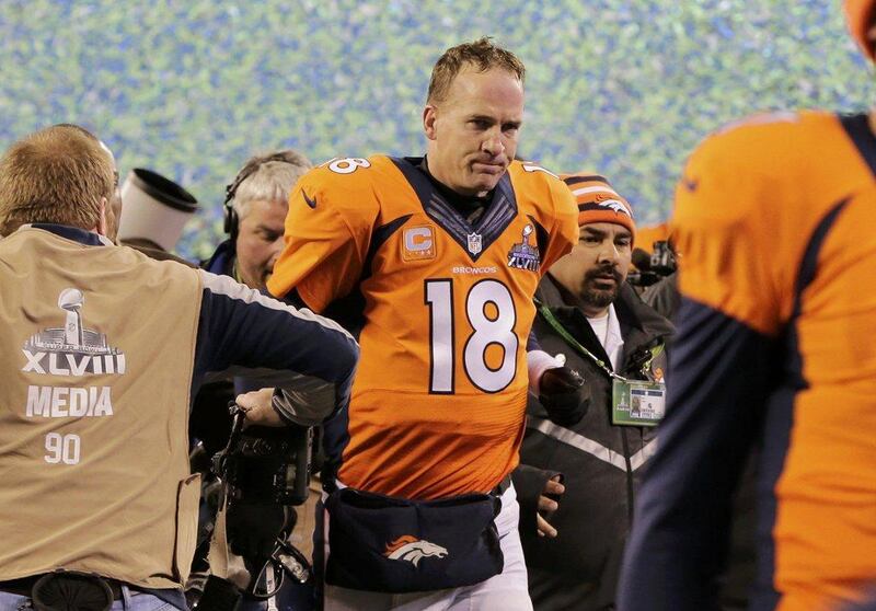 Denver Broncos quarterback Peyton Manning leaves the field after his team loses to the Seattle Seahawks in the Super Bowl. Ray Stubblebine / Reuters 