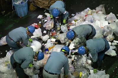 TOKYO, JAPAN - NOVEMBER 19: Workers sort through plastic household waste at Minato plastic household waste at Minato Resource Recycle Centre on November 19, 2020 in Tokyo, Japan. Despite its size, Japan is the world's second largest exporter of plastic waste after the USA and is second only to the US in consumption of single-use plastic packaging per person. Around 10 million tons of plastic is produced a year - the third highest amount in the world - with roughly three quarters being discarded within 12 months. Although the government has made efforts recently to address the issue, it declined, along with the USA, to sign a 2017 agreement between G7 countries to reduce the amount of plastic waste in the worlds oceans and cut down on the usage of single-use plastics, such as straws, bottles and cups. Japan has one of the lowest plastic recycling rates among OECD countries - with approximately 75 percent of waste sent to incinerators where it has to be burnt using ultra-high-temperature furnaces and filter systems to avoid releasing dioxins. However, the resulting exhaust fumes contribute to climate change. (Photo by Carl Court/Getty Images)
