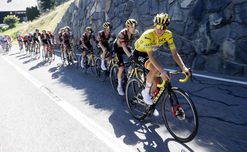 Slovenia's Tadej Pogacar in the race leader's yellow jersey during Stage 9, a 192.9km ride from Aigle in Switzerland to Chatel Les Portes du Soleil in France. EPA