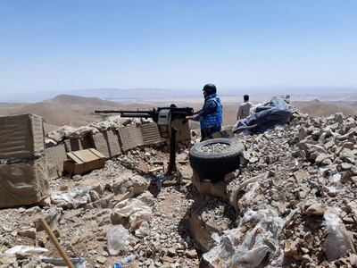 Fighters from the Syrian army units and Hezbollah are seen on the western mountains of Qalamoun, near Damascus, in this handout picture provided by SANA on July 23, 2017, Syria. SANA/Handout via REUTERS  ATTENTION EDITORS - THIS PICTURE WAS PROVIDED BY A THIRD PARTY. REUTERS IS UNABLE TO INDEPENDENTLY VERIFY THE AUTHENTICITY, CONTENT, LOCATION OR DATE OF THIS IMAGE.