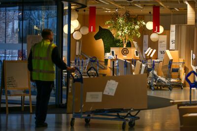 An employee prepares an order at an Ikea store in Britain. Getty Images
