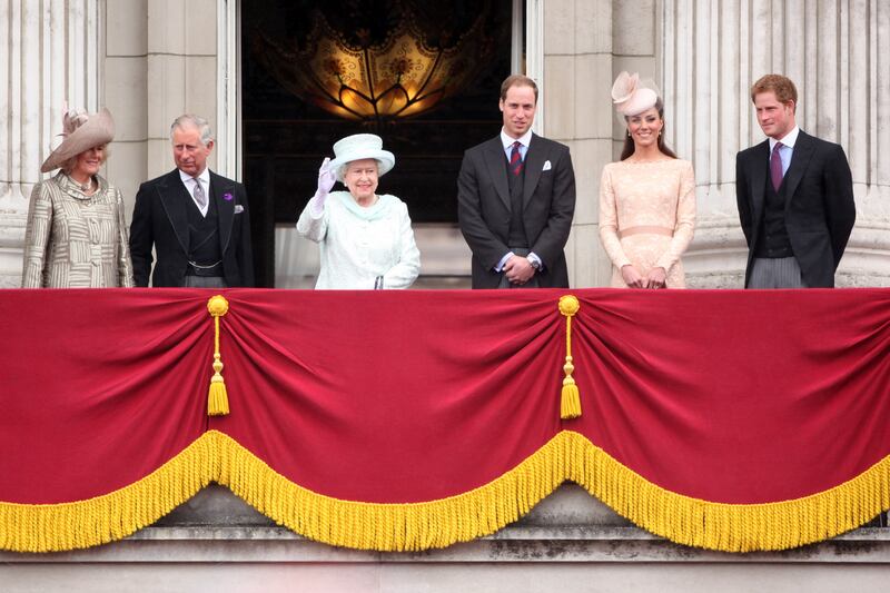 Camilla, Duchess of Cornwall, Prince Charles, Queen Elizabeth, Prince William, Catherine, Duchess of Cambridge and Price Harry wave to the crowds from Buckingham Palace during the diamond jubilee celebrations in June 2012.