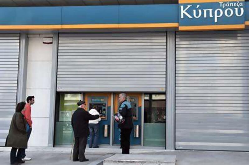 Depositors have been withdrawing their money from Cypriot banks in the past few days. Louisa Gouliamaki / AFP