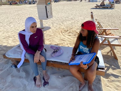 Student Sawsan Mohsen, 31, and instructor Leila Aziz, 16, during a theory lesson. Nada El Sawy / The National