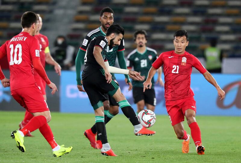 ABU DHABI , UNITED ARAB EMIRATES , January 21 – 2019 :- Bandar Mohamed Al Ahbabi ( no 9 in green UAE ) in action during the AFC Asian Cup UAE 2019 football match between UNITED ARAB EMIRATES vs. KYRGYZ REPUBLIC held at Zayed Sports City in Abu Dhabi. ( Pawan Singh / The National ) For News/Sports

