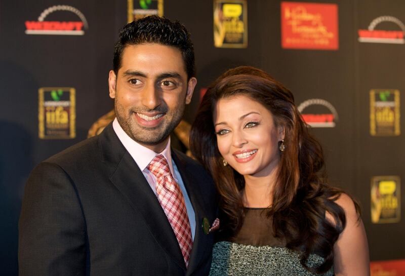 MACAU, CHINA - JUNE 11:  Indian actor Abhishek Bachchan (L) and his wife, actress Aishwarya Rai attend the 2009 International Indian Film Academy Awards at the Venetian Macao-Hotel-Resort on June 11, 2009 in Macau, China.  (Photo by Victor Fraile/Getty Images)