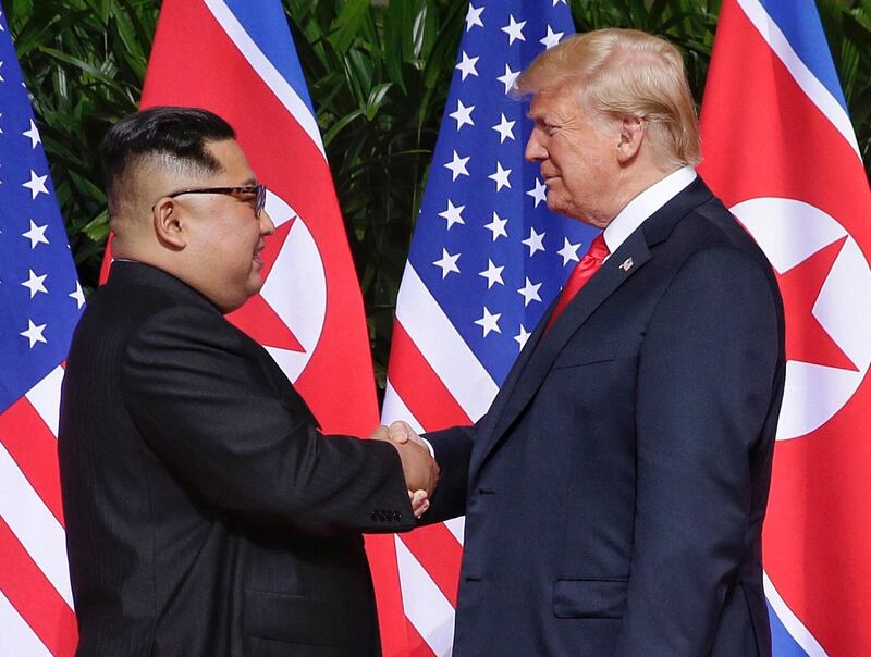 epa07299211 (FILE) - US President Donald J. Trump (R) and North Korean leader Kim Jong-un (L) shake hands at the start of a historic summit at the Capella Hotel on Sentosa Island, Singapore, 12 June 2018 (reissued 19 January 2019). According to media reports, US President Donald J. Trump and North Korean leader Kim Jong-un are expected to hold a second summit in late February.  EPA/KEVIN LIM / THE STRAITS TIMES / SPH SINGAPORE OUT  EDITORIAL USE ONLY