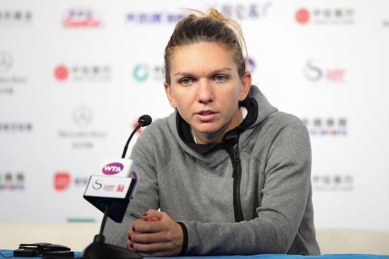 BEIJING, CHINA - SEPTEMBER 30:  Simona Halep of Romania reacts during a press conference after losing to Ons Jabeur of Tunisia in their Women's Singles 1nd Round match of the 2018 China Open at the China National Tennis Centre on September 30, 2018 in Beijing, China.  (Photo by Lintao Zhang/Getty Images)