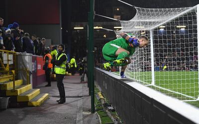 BURNLEY, ENGLAND - DECEMBER 26:  Burnley goalkeeper Joe Hart vaults the advertising boards to collect the ball during the Premier League match between Burnley FC and Everton FC at Turf Moor on December 26, 2018 in Burnley, United Kingdom.  (Photo by Stu Forster/Getty Images)