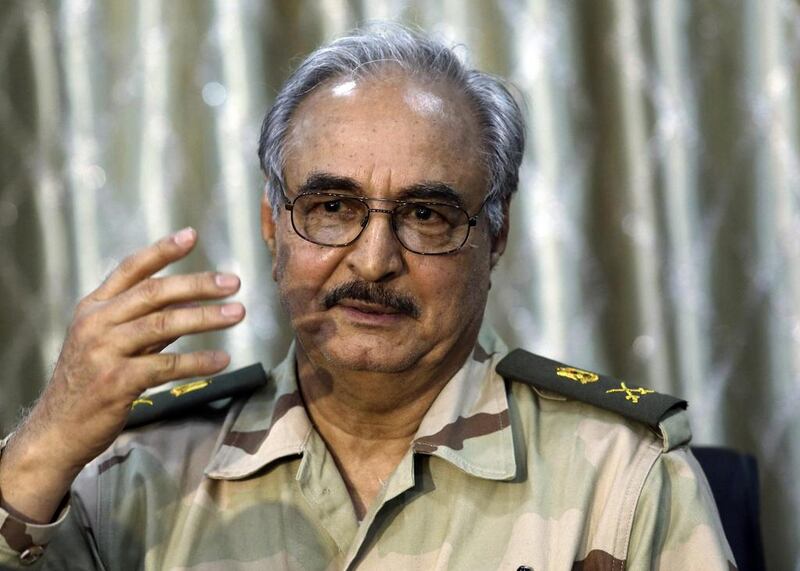 The renegade Libyan general Khalifa Haftar speaks during a news conference at a sports club in Abyar, a small town to the east of Benghazi, on Saturday. Esam Omran Al-Fetori / AP