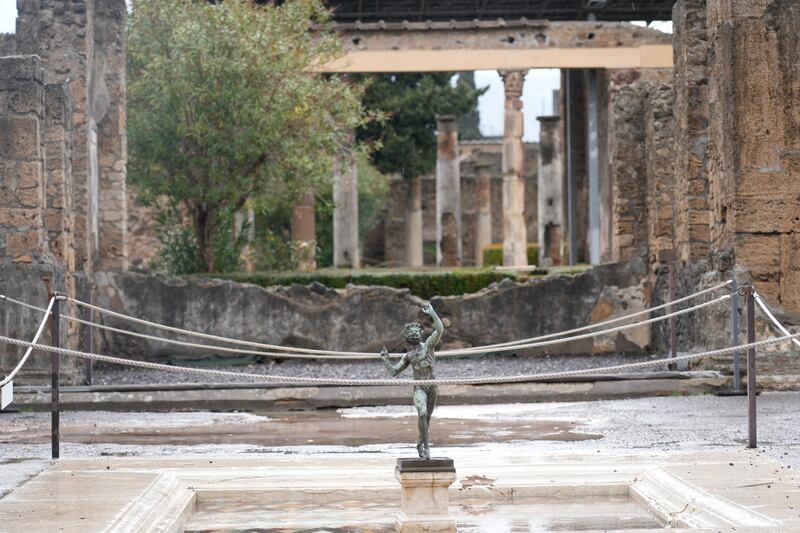 A statue of a Faunus. In a few horrible hours, Pompeii went from being a vibrant city to a dead one, smothered by a furious volcanic eruption in 79AD.