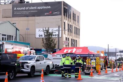 Firefighters at the Loafers Lodge hostel building in Wellington, New Zealand, on May 16. AFP