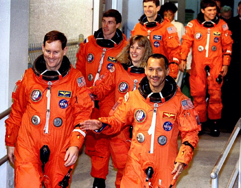 Space shuttle Discovery astronauts, front row, left-to-right, Pilot Kenneth Reightler, Jan Davis, Commander Charles Bolden, back row, Sergei Krikalev of Russia, Ronald Sega and Franklin Chang-Diaz depart crew quarters Feb. 3 for the launching pad - PBEAHUNFXCM