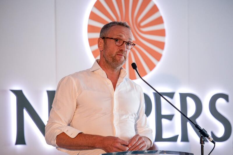 Bob Van Dijk, chief executive officer of Naspers Ltd., pauses during the company's extraordinary general meeting in Cape Town, South Africa on Friday, Aug. 23, 2019. Africa’s largest company by market value is creating a new entity called Prosus NV to hold assets including a 31% stake in Chinese internet giant Tencent Holdings Ltd. that’s worth about $125 billion. Photographer: Dwayne Senior/Bloomberg