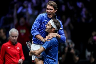 epa06262743 YEARENDER 2017 SEPTEMBER 
Switzerland's Roger Federer (down) and Spain's Rafael Nadal of the Team Europe celebrate after winning the Laver Cup tennis tournament in Prague, Czech Republic, 24 September 2017.  EPA/MARTIN DIVISEK