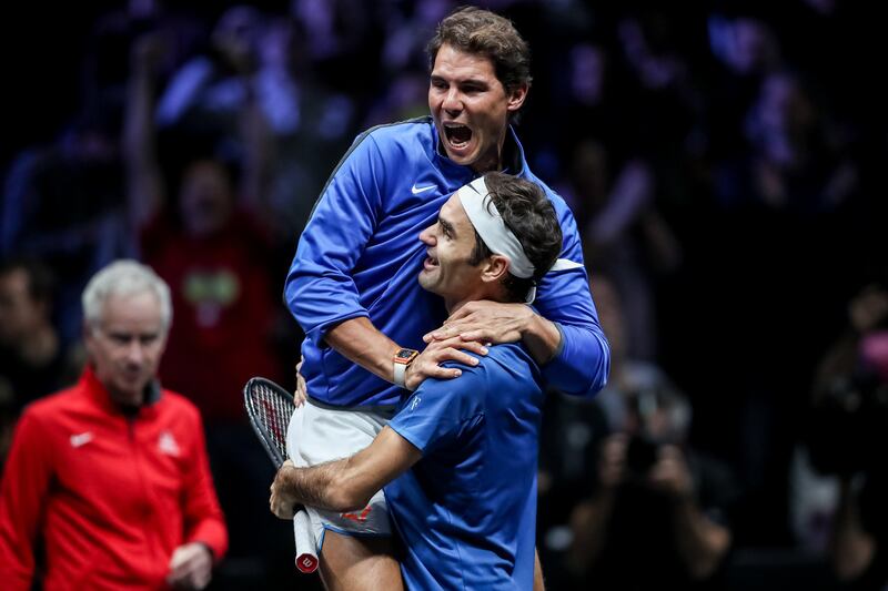 epa06262743 YEARENDER 2017 SEPTEMBER 
Switzerland's Roger Federer (down) and Spain's Rafael Nadal of the Team Europe celebrate after winning the Laver Cup tennis tournament in Prague, Czech Republic, 24 September 2017.  EPA/MARTIN DIVISEK