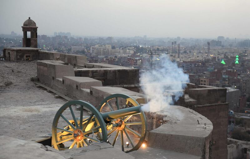 The cannon was fired for the first time since 1992 to alert people to break their fast at sunset. EPA
