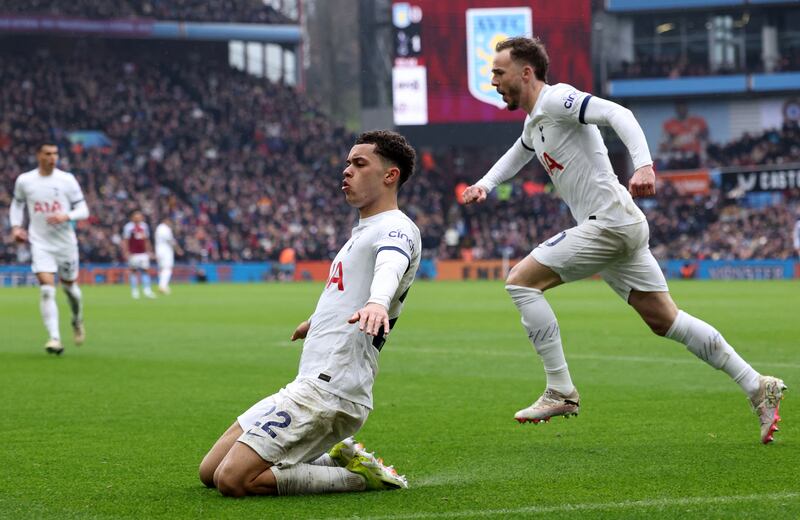 Tottenham Hotspur's Brennan Johnson celebrates with teammate James Maddison after scoring their second goal against Aston Villa. Reuters