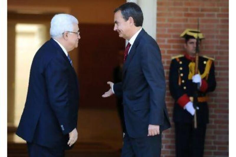 Spain's prime minister, Jose Luis Rodriguez Zapatero, right, welcomes Palestinian president Mahmud Abbas at the Moncloa palace in Madrid during Abbas's visit aimed at drumming up support for United Nations recognition of a Palestinian state. Dominique Faget / AFP Photo