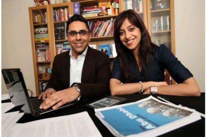 Rahim Hirji and his wife Zohara working on their Abu Dhabi travel guide ebook from their home in Harrow, UK. Stephen Lock for The National