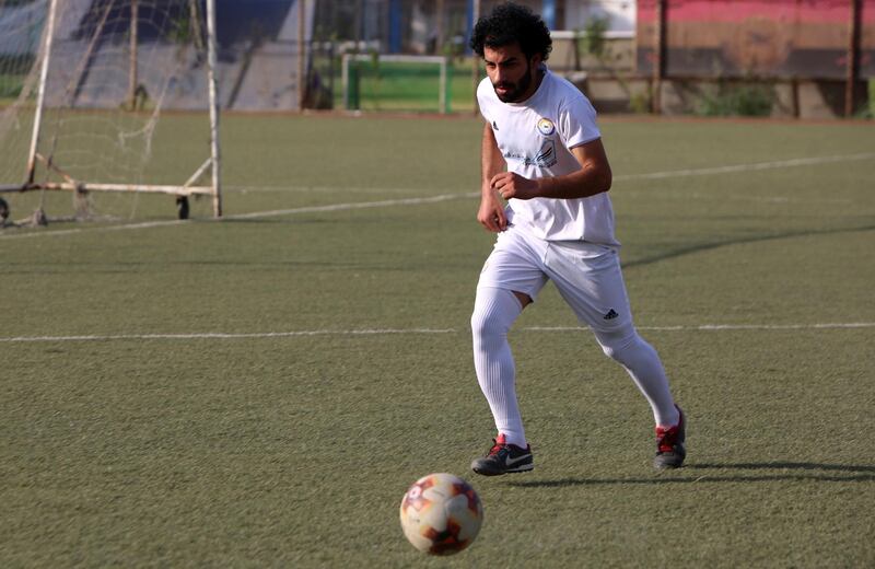 Passionate about football since his was little, Mr Ali made it onto the B team of Al Zawraa, Iraq's most decorated club.
One day he hopes to live the same dream as Salah and play international football. Sabah Arar / AFP
