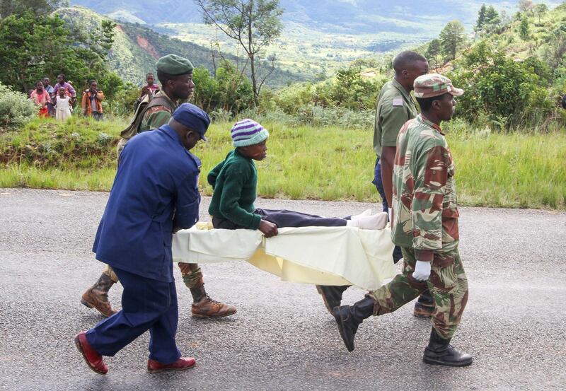 A girl is carried on a stretcher after being injured in the wake of Cyclone Idai in Chimanimani, Zimbabwe. Getty Images