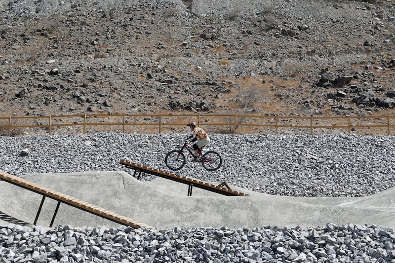 FUJAIRAH, UNITED ARAB EMIRATES , March 23, 2021 –   Tyler Bruce, enjoying riding a bicycle at the Fujairah Adventures Park in Fujairah. (Pawan Singh / The National) For Instagram/Online/ Lifestyle. Story by Janice Rodrigues