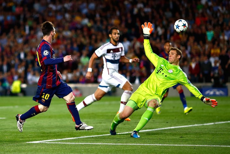 BARCELONA, SPAIN - MAY 06:  Lionel Messi of Barcelona scores his second goal against Manuel Neuer of Bayern during the first leg of UEFA Champions League semifinal match between FC Barcelona and FC Bayern Muenchen at Camp Nou on May 6, 2015 in Barcelona, Spain.  (Photo by Vladimir Rys Photography/Getty Images)