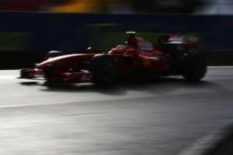 SAO PAULO, BRAZIL - OCTOBER 17:  Kimi Raikkonen of Finland and Ferrari drives during qualifying for the Brazilian Formula One Grand Prix at the Interlagos Circuit on October 17, 2009 in Sao Paulo, Brazil.  (Photo by Mark Thompson/Getty Images)