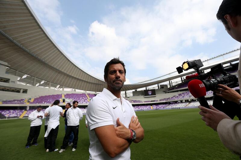 Al Ain coach Quique Sánchez Flores is asking his team to seize the moment of history as they open the new Hazza Bin Zayed Stadium against Al Dhafra. Satish Kumar / The National 