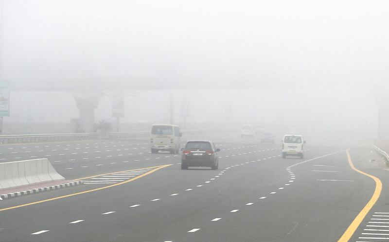 DUBAI, UNITED ARAB EMIRATES , April 08 – 2020 :- View of the SZR during the early morning fog in Dubai. Dubai is conducting 24 hours sterilisation programme across all areas and communities in the Emirate and told residents to stay at home. UAE government told residents to wear face mask and gloves all the times outside the home whether they are showing symptoms of Covid-19 or not. (Pawan Singh/The National) For News/Online/Instagram/Standalone