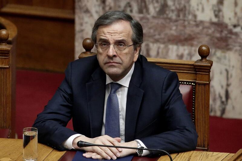 Antonis Samaras, Greece's prime minister, looks on while attending parliament during the final vote for a new president in Athens, Greece, on Monday, Dec. 29, 2014. Greece faces snap elections next month after Samaras failed in his third and final attempt to persuade parliament to back his candidate for head of state. Photographer: Kostas Tsironis/Bloomberg *** Local Caption *** Antonis Samaras