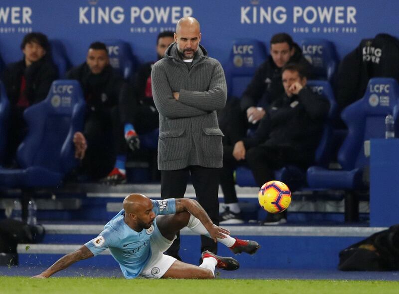 Delph in action as manager Pep Guardiola looks on. Action Images via Reuters