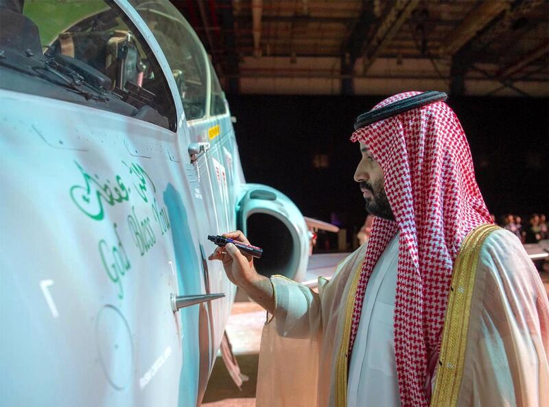 Crown prince Mohammed bin Salman launches the first Hawk trainer jet assembled locally. Saudi Press Agency