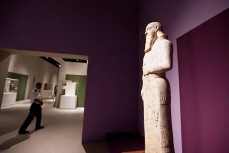 Carved magnesite statue of Ashurnasirpal II, from Nimrud, Ishtar Sharrat-nihi temple from 883-859 BCE,  stands on display on Tuesday, March 22, 2011, as the Splendours of Mesopotamia exhibition is prepared at the Manarat al Saadyiat on the Saadyiat Island in Abu Dhabi. The show, which is prepared under the patronage of H.H. Sheikh Mohammed bin Zayed al Nahyan, introduces more than 200 ancient Mesopotamia art works from the collections of British Museum and Al Ain National Museum. The show is first in line of three exhibitions organized in Abu Dhabi that are dedicated to the Zayed National Museum narative. 
(Silvia Rázgová / The National)

Artwork ID: 
Carved magnesite statue of Ashurnasirpal II on reddish dolomite stand. 
From Nimrud, Ishtar Sharrat-nihi temple, 
883-859 BCE.