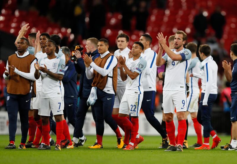 England players applaud the crowd after beating Slovenia. Kirsty Wigglesworth / AP Photo