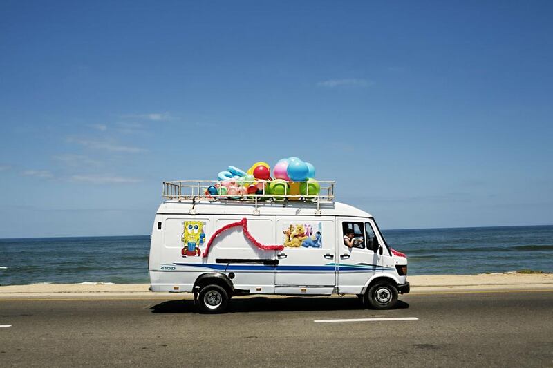 Gaza: A toy store van drives along Gaza's beach high way. Courtesy Tanya Habjouqa