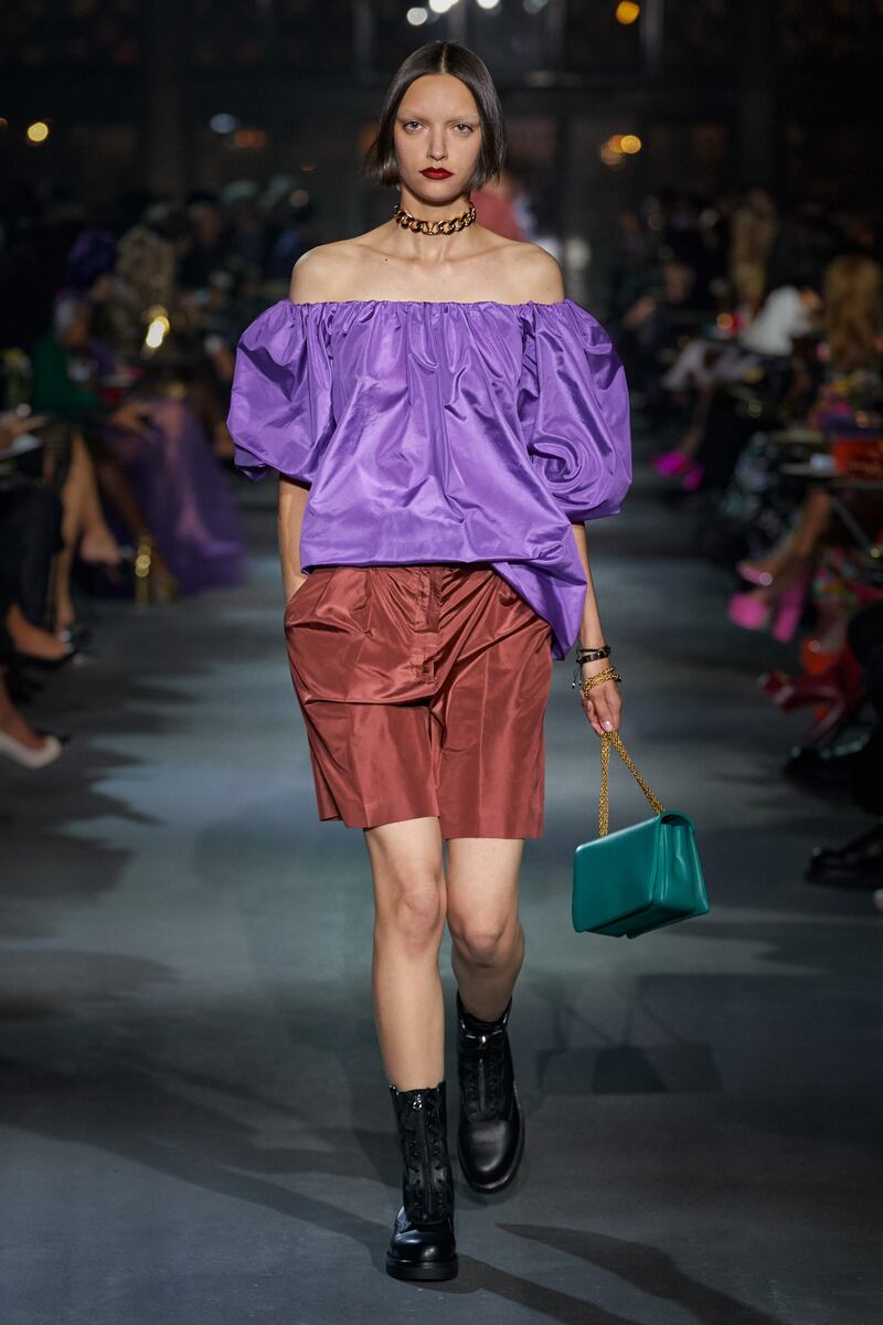 A look from the Valentino show mixes copper with purple
